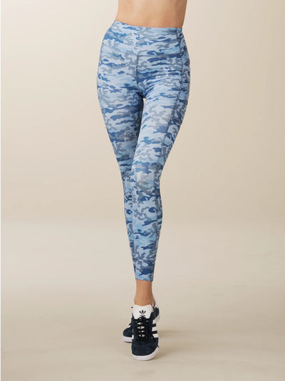 model wears sculpting blue camo pocket leggings