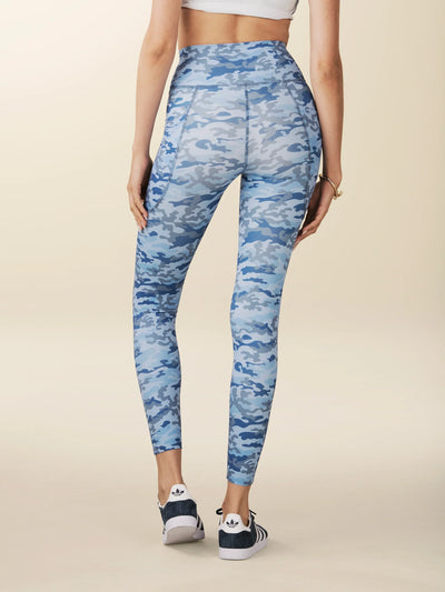 model wears sculpting blue camo pocket leggings