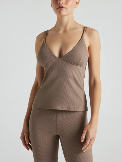 Model wears light brown rib triangle tank with built in bra