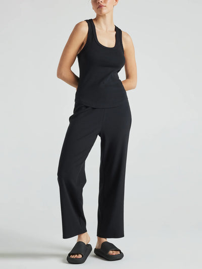 model wears black wide leg relaxed rib cropped pant