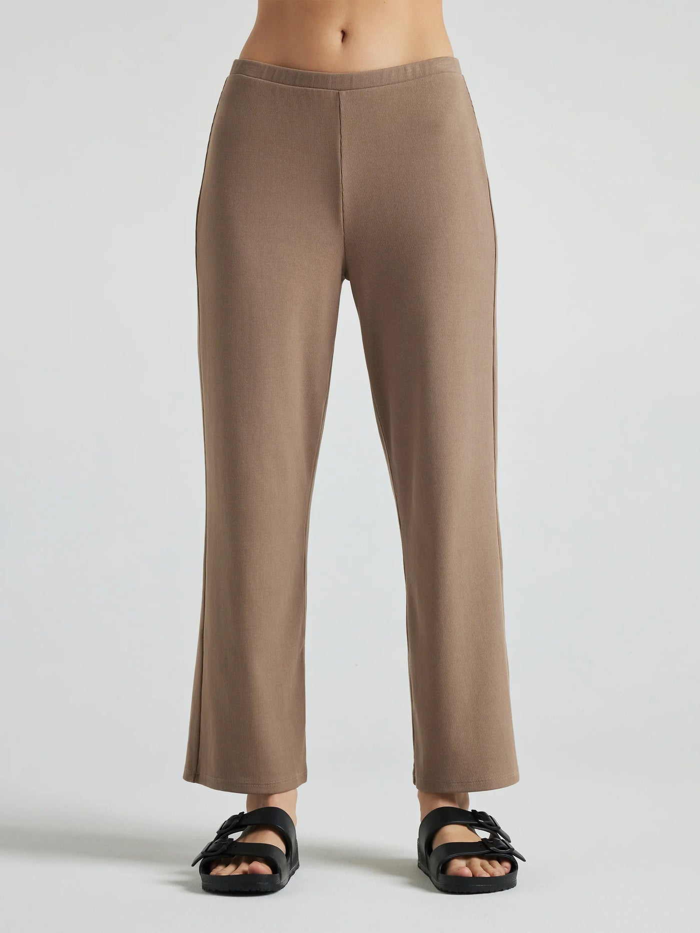 model wears light brown wide leg relaxed rib cropped pant