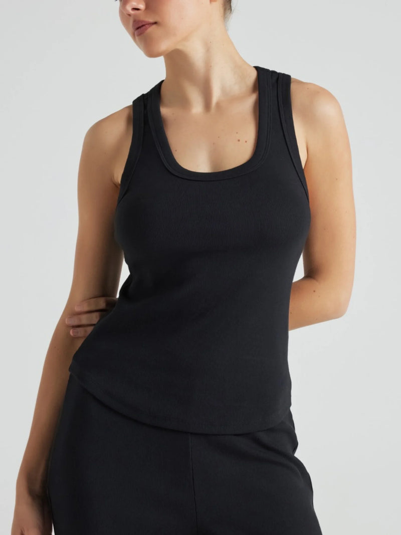 Model wears black luxury ribbed tank