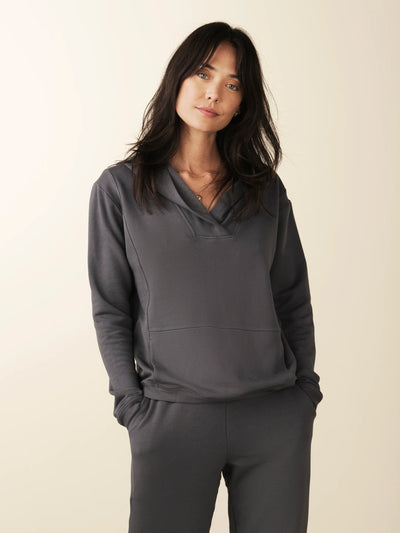 model wears cozy grey v neck hoodie