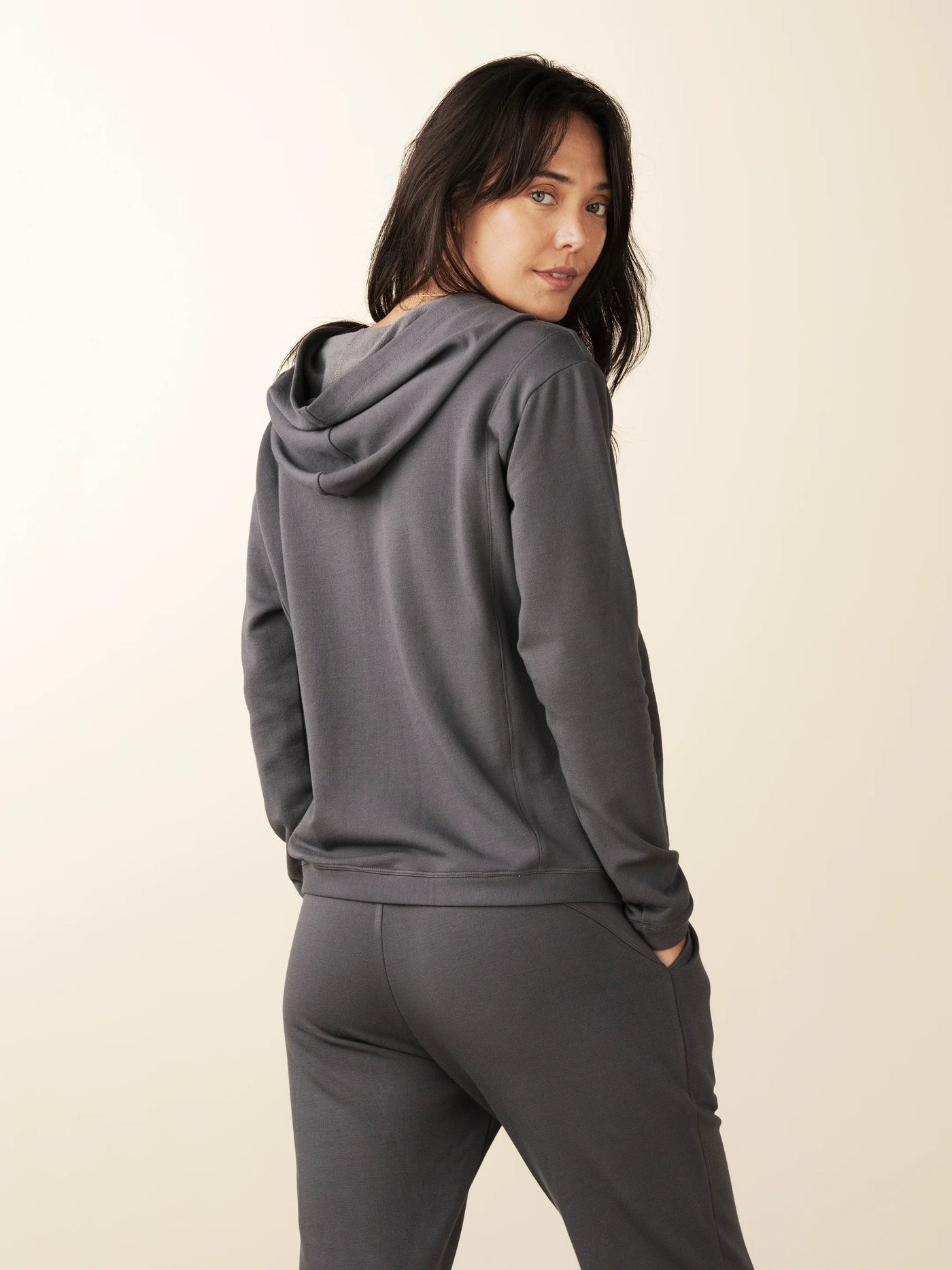 model wears cozy grey v neck hoodie