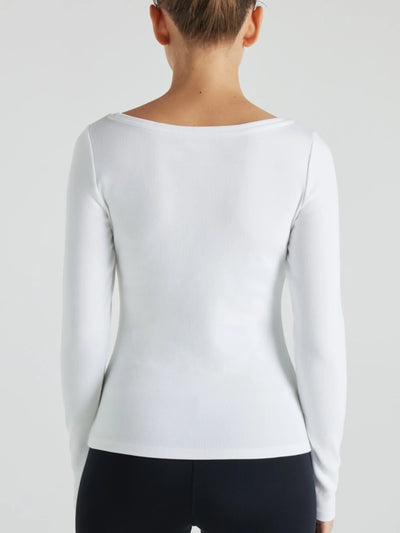 model wears white boat neck long sleeve