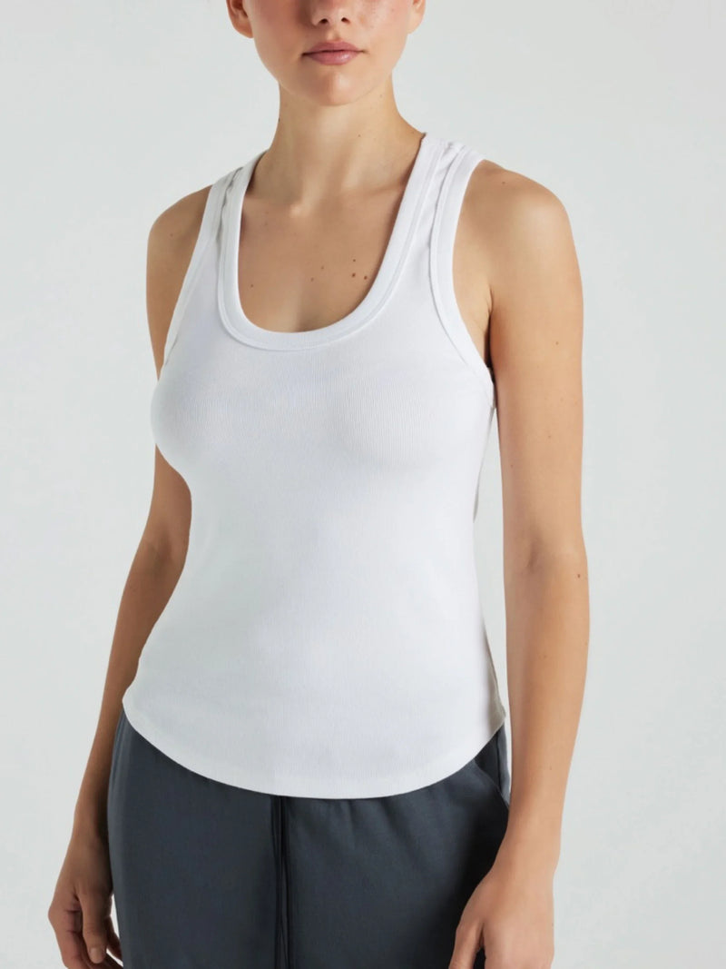 Model wears white luxury ribbed tank