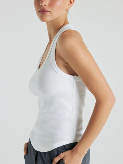 Model wears white luxury ribbed tank